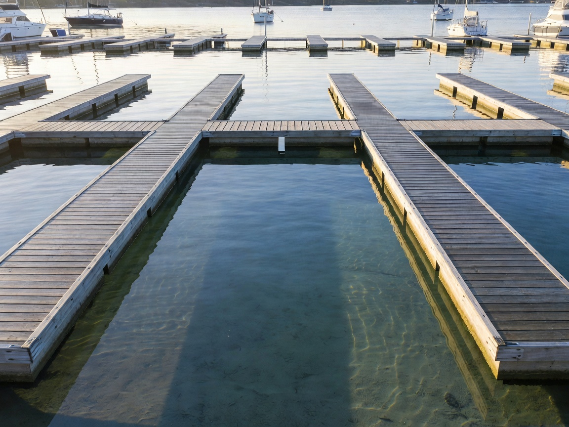 Freshly cleaned spring marina pontoons with gleaming water and clear slips